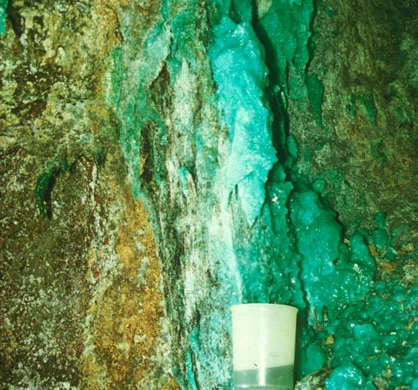 Collecting drainage in the Iron Mountain Mine, Redding, California.