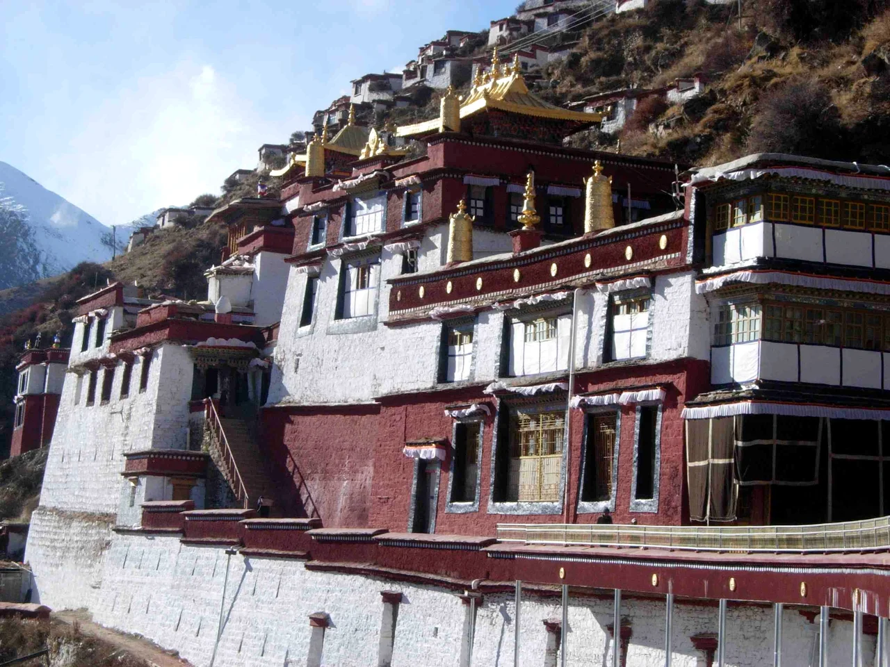 en:Drigung Monastery
Accrding to en.wikipedia: Photographed by Mark Evans in November 2005 using a Nikon Coolpix 5200. Photo is of Drigung monastery, a monastery in Tibet that performs sky burials.